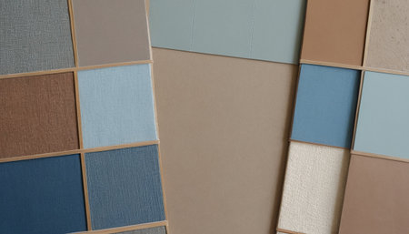 Beige, blue, brown and beige fabric samples background.の素材