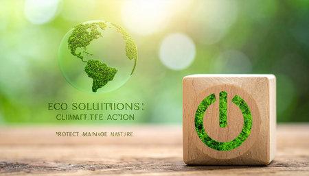 Wooden block with green earth and power button on bokeh backgroundの素材