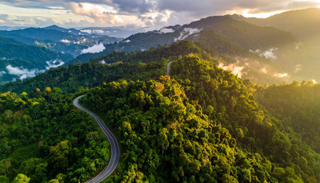 Aerial view of road in the mountains at sunset,Thailandの素材