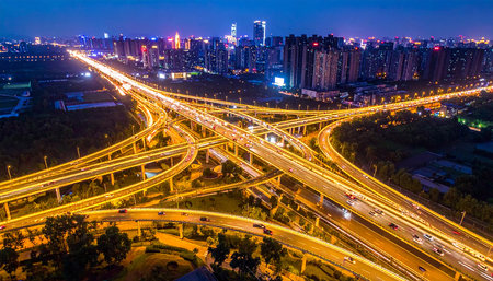 Aerial view of highway junction in Shenzhen at night, Chinaの素材