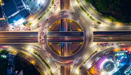 Aerial view of highway road junction in Hong Kong city at nightの素材
