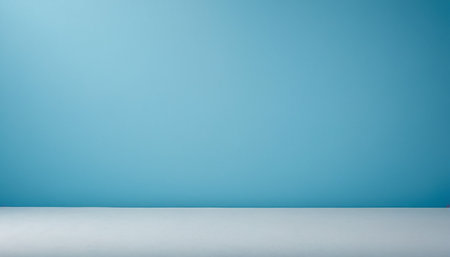 Empty white table and blue wall background. Mock up for display of productの素材