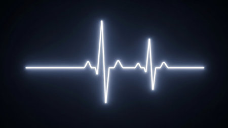 A bright white electrocardiogram waveform pulses against a deep, dark background, symbolizing life and vital signs.の素材