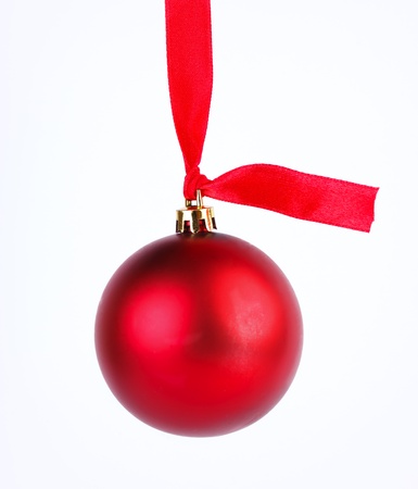 Red  ball and red ribbon isolated on whiteの写真素材
