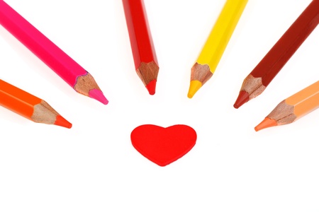 Colorful pencils and heart isolated on whiteの写真素材