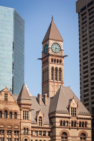 View of the old City Hall of Toronto, Canada against moder buildingsの写真素材