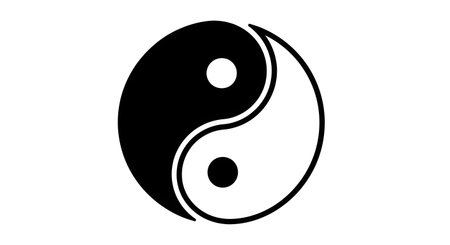 A stark black and white Yin Yang symbol, representing duality and interconnectedness, is depicted in a clean, minimalist style.の素材