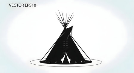 A stark black silhouette of a conical teepee structure stands on a circular base against a softly blurred background.の素材