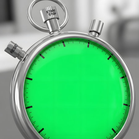 A detailed, close-up view of a stopwatch, featuring a bright green dial and metallic casing. The background is blurred.の素材