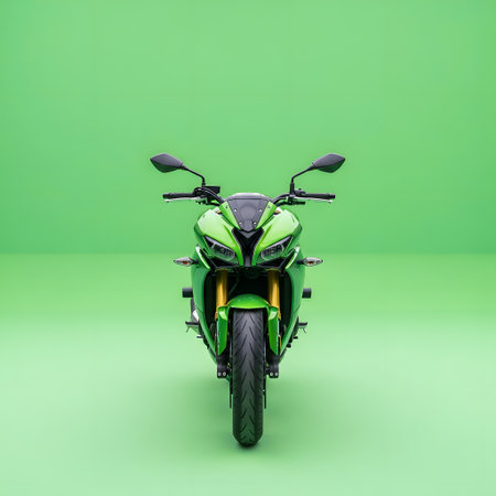 A striking, modern green sportbike is captured head-on against a vibrant, solid green backdrop, highlighting its aggressive design and powerful stance.の素材