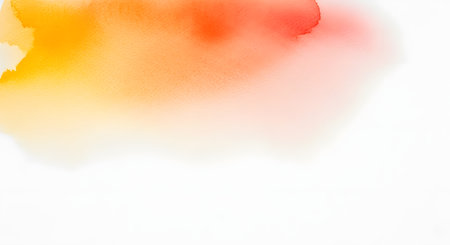 A soft, ethereal watercolor wash blends warm tones of yellow, orange, and red against a clean white background.の素材