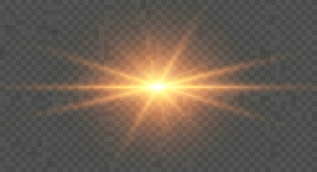 A radiant golden starburst emanates from a central point, creating a bright lens flare effect against a transparent background.の素材