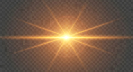 A radiant golden starburst flares outward with sharp beams of light, creating a luminous effect against a transparent grid.の素材