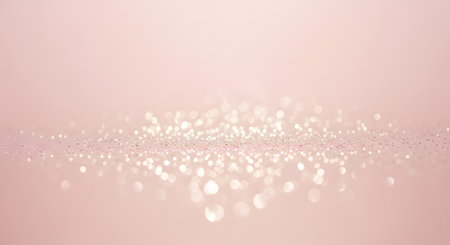 A dreamy, soft pink background with a gentle gradient, adorned with shimmering bokeh lights and a faint, elegant text overlay.の素材