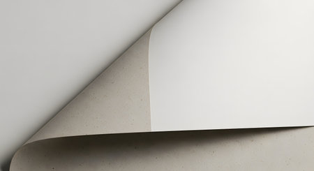 A minimalist abstract image featuring two curved layers of paper, one white and one beige, revealing a subtle texture and shadow play.の素材