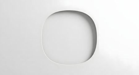 A minimalist composition featuring a smooth, oval-shaped cutout against a subtly textured white background, creating a sense of depth and simplicity.の素材