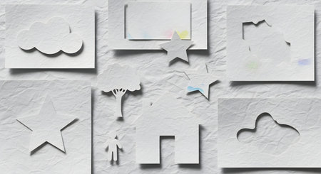 A collection of abstract geometric shapes and cutouts arranged on a textured, light-colored surface, creating a minimalist composition.の素材