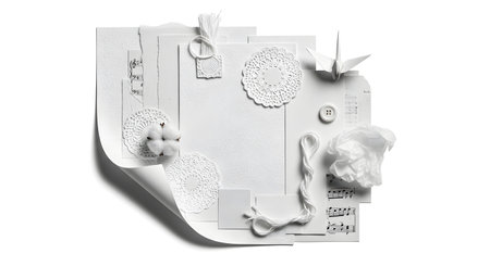 A white abstract sculpture with organic, textured elements, casting a distinct shadow on a white background, suggesting movement and form.の素材