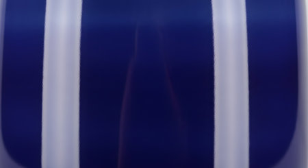 A close-up, abstract view of alternating vertical stripes of deep, rich blue and bright white.の素材