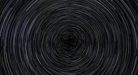 Concentric rings of light and dark create a mesmerizing, almost hypnotic visual effect with a deep, dark center.の素材