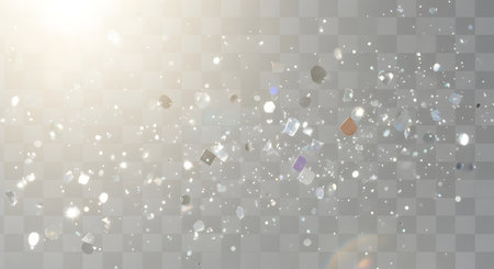 Sunlight reflects off a wet surface, creating a bokeh effect with scattered bright spots and subtle hints of red and orange.の素材