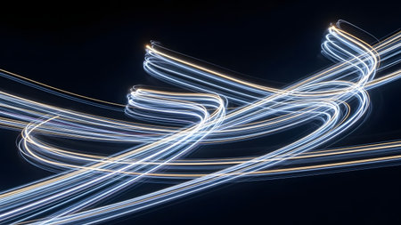 A mesmerizing display of light trails, captured in a long exposure shot, showcasing vibrant colors and dynamic patterns against a dark background, evoking a sense of energy and movement.の素材