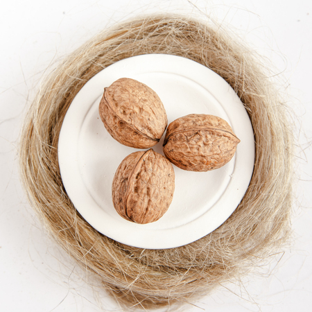 Walnuts on a plateの写真素材