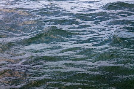 restless sea full of waves background