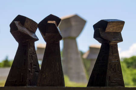 Nis, Serbia - June 02th 2021: Bubanj Memorial Park - wooden model. In background Monument to victims from World War II in original size..Photo taken on June 02th 2021.のeditorial素材