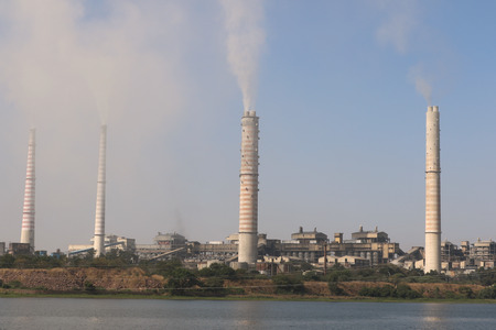 Kota thermal power plant, across Chamble river, emitting smoke constantly and increasing pollution in the environment.のeditorial素材
