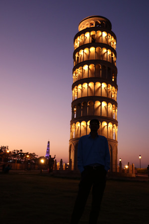 The replica of Leaning Tower of Pisa in the Seven Wonders park, Kota the monument look quite beautiful in the evenings with good lightings and lake in the background.のeditorial素材