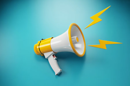 Yellow and white megaphone with lightning on blueの素材