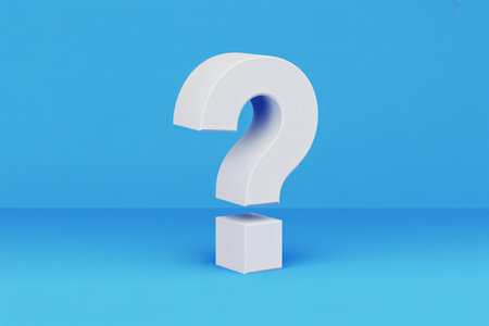 White question mark on a blue studio backgroundの素材