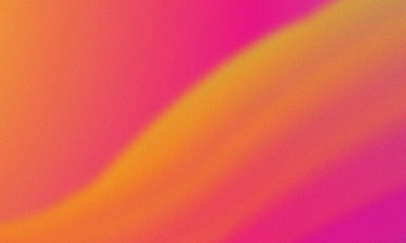 Colorful blend vibrant pink orange yellow gradient with subtle grain textureの写真素材