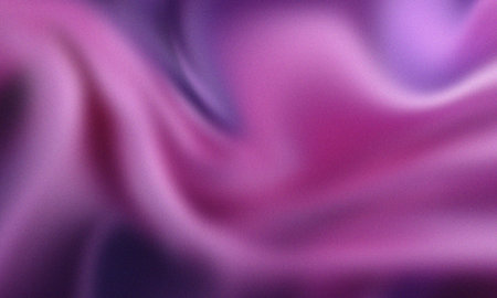 Abstract flowing purple and pink gradient background with textured noiseの写真素材