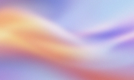 Grainy ethereal gradient with soft orange purple and blue color blend textureの写真素材