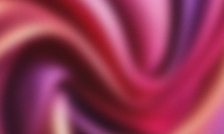 Abstract vibrant pink, purple, red gradient background with grainy textureの写真素材
