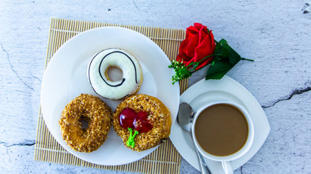 Donut with coffee on morningの写真素材