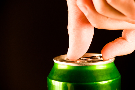 opening a can of beerの写真素材