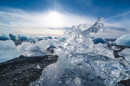 black beach with pieces of ice, Icelandの写真素材