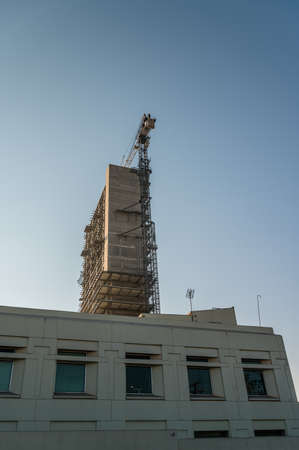 New construction high-rise with crane