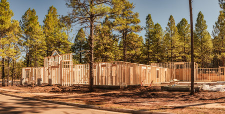 Wood framework of new home being constructed in beautiful area.の写真素材