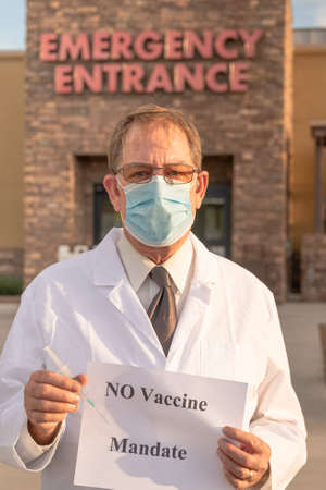 Physician holding  a sheet of paper.の写真素材