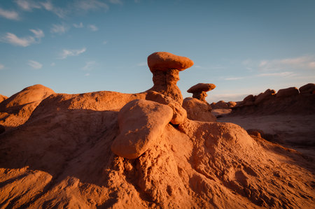 Hoodoos in Goblin Valley State Park in Utah at sunsetの写真素材