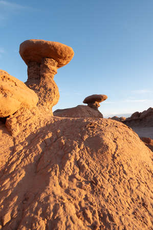 Hoodoos in Goblin Valley State Park in Utah at sunsetの写真素材