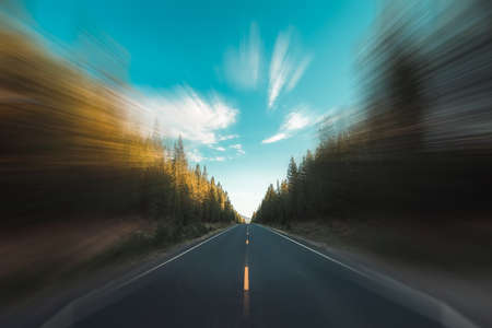 Highway Oregon diminishing perspective at dawn. Selective blur.の写真素材