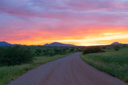 Fire sunset in Sonoita, Arizona. Santa Rita mountains in distance.の写真素材