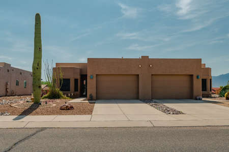 New one-story, beige stucco homeの写真素材
