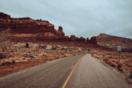 Empty Pavement Road Towards Hite Marina Campground In Hite, Utah, United Statesの写真素材