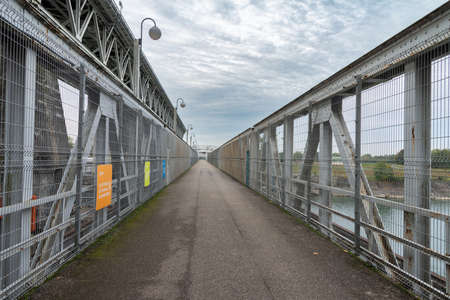 A weir to control river flow of the Rhine River in Maerkt, Germany.